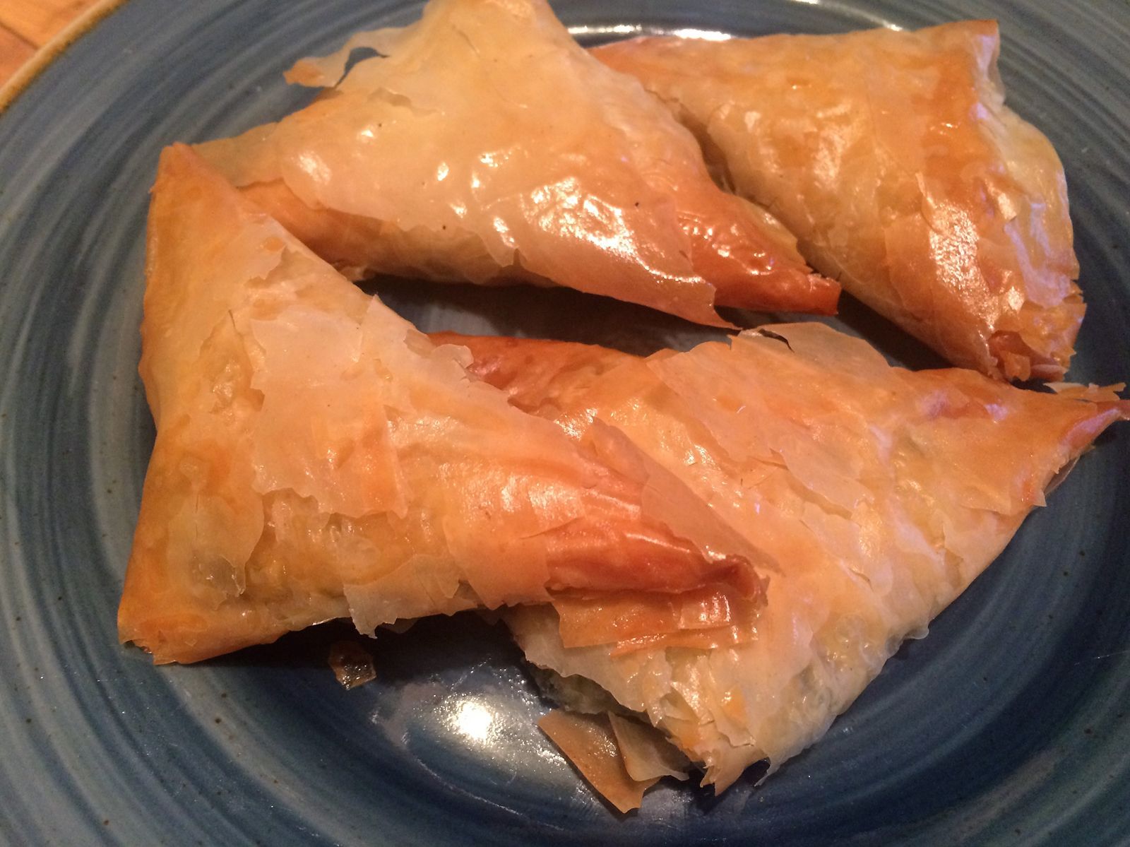 Spanakopita, the Greek pastry of dreams, is crispy on the outside, cheesy on the inside, and totally worth the effort. Whether you fold it into perfect little triangles or go the lazy 9x13 pan route, it’s always a crowd-pleaser.