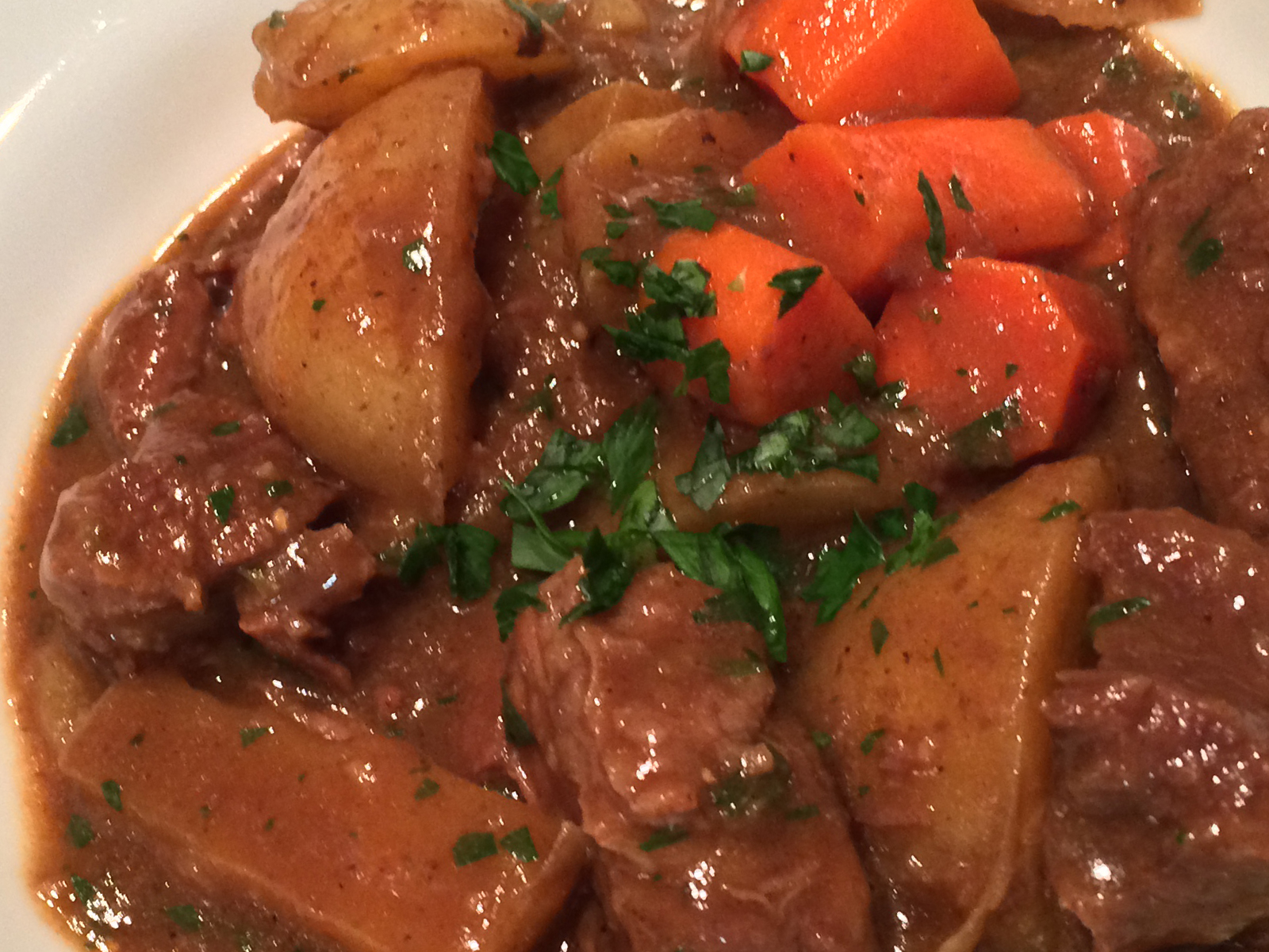 Guinness Beef Stew This stew is simply wonderful. The beer flavor is mild allowing the beef to shine. The carrots and onion add sweetness. The potatoes ground it so to speak. If you have an afternoon to devote to making this your efforts will be awesomely rewarded.