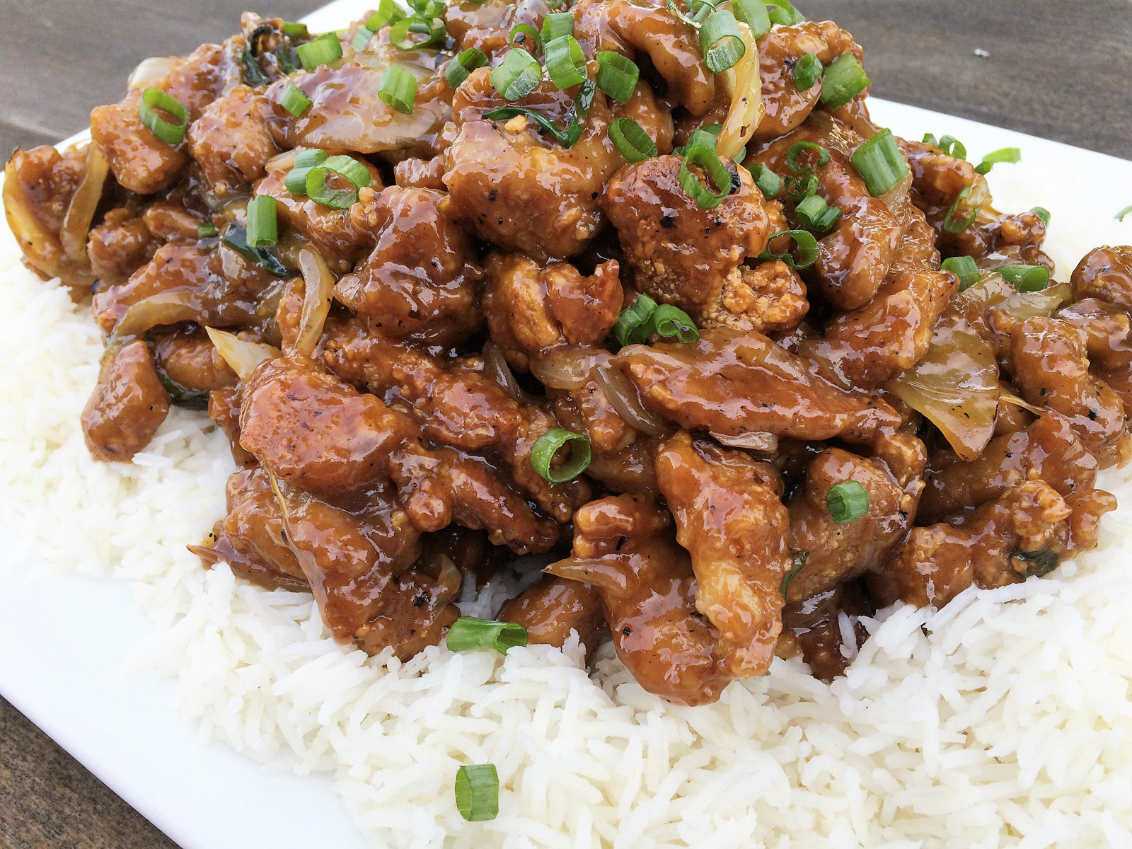 Move over Mongolian beef! This Crispy-Sweet Pork and Onions recipe delivers tender pork, caramelized onions, and a finger-licking sauce. Yes, it's a little messy, but you'll forgive it after the first bite.